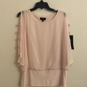 Women’s top with rhinestone accent sleeves